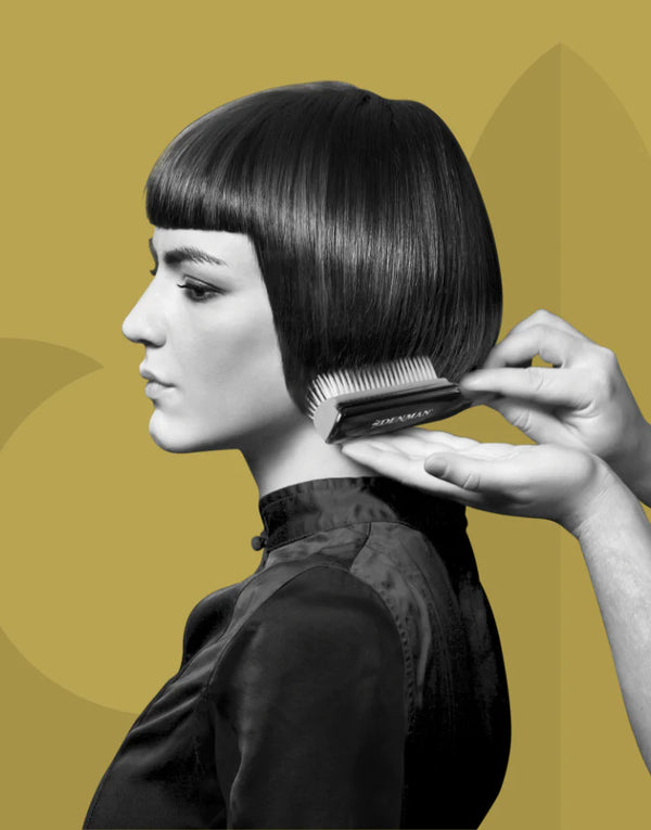 Girl getting hair brushed